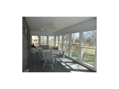 Bright, open sun room to enjoy flowering trees thi