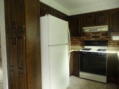 Kitchen. The kitchen offers extra storage with bui