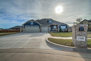 View of front of property with a front yard and a 