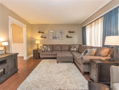 GORGEOUS HARD WOOD FLOORING, NEW WINDOWS, OPENS TO