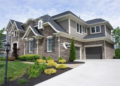 3 gar side load garage, full brick wrap and professional landscaping. 