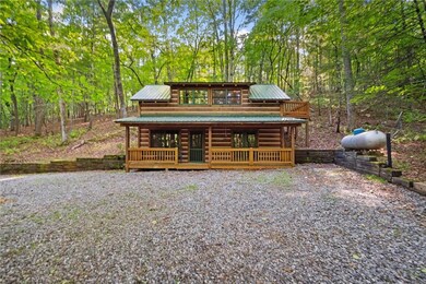Log-style house with metal roof