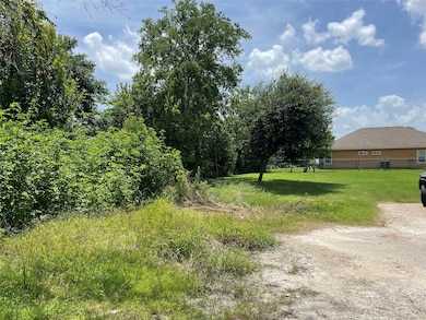 Lot right side coming from Bryan Ave.