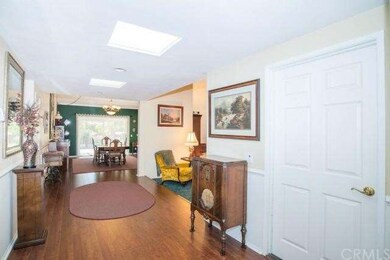 View from the entryway into the large foyer toward