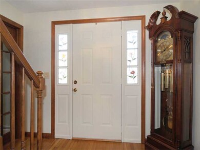Entry. Front foyer with stained glss windows.