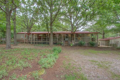 This stunning home has an enormous covered porch,