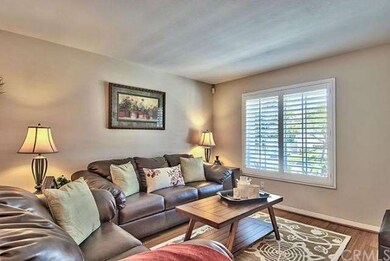 Formal Living Room featuring Front Window with Pla