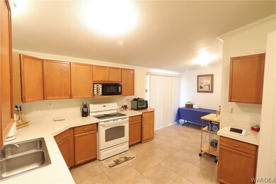 The kitchen has lots of counter space and cabinetr