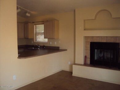 Fireplace in Family room off of kitchen