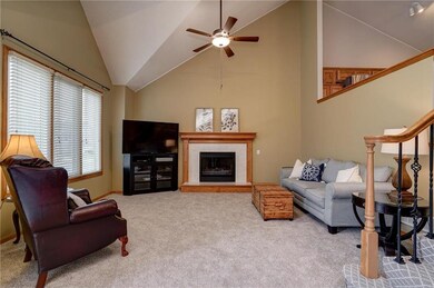 Large living room with gas fireplace, vaulted ceil