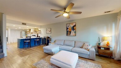 Living room featuring light wood-style flooring, v