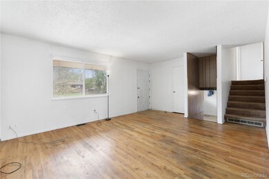 Front Entry into the Living Room with hardwood flo