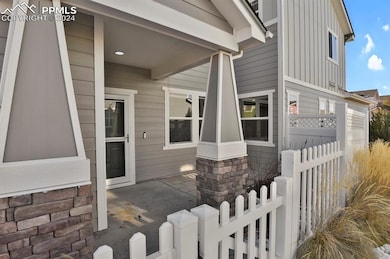 Fenced in front porch