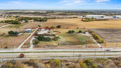 Overview of rural landscape with property parcel outlined