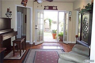 Den or T.V. Room with Gorgeous Wood Floors and Fre