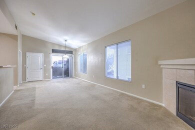 Unfurnished living room featuring light colored ca
