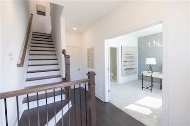 bedroom on terrrace level has its own private bathrrom with double doors, cannot also be used as an at home office, living room, work out room, use your imagination- furniture not included, Pictures are for representation only, not the actual home