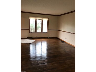 Hardwood floors refinished in living room and dini