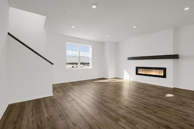 Living Room *Photo of a previously built home with the same floorplan, finishes/options may vary.