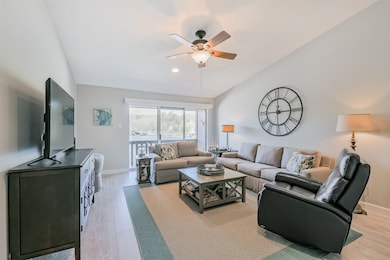 Living room offers wonderful views of the lake, hi