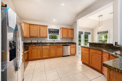 Lot of cabinets for storage, and granite counterto