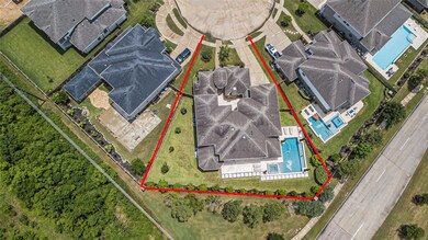 Amazing aerial shot of this gorgeous Taylor Morrison home situated on a quiet cul-de-sac street in the sought after community of Avalon at Spring Green and zoned to Katy ISD.