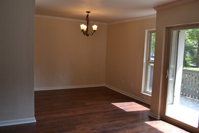 Lovely new light fixture, laminate floors and newl