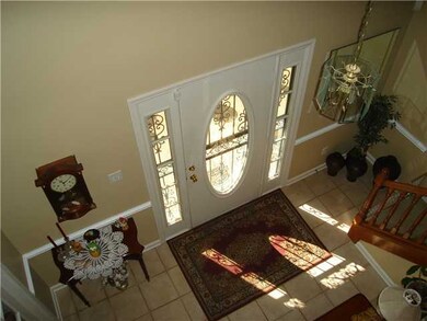 Looking down from the balcony into the Foyer