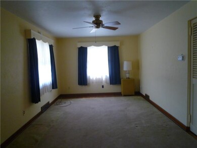 Living Room. SPACIOUS LIVING ROOM W/ HW UNDER CARP