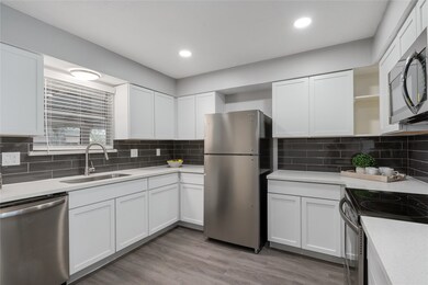 Enjoy crisp white cabinets and stainless steel app