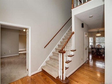 Formal entry opens to dining and breakfast and provides convenient access to sitting room of main level Owners Suite