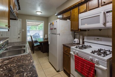 Open concept kitchen with view of the dinning room.