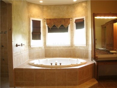 This is an oversized jacuzzi that can fit a 7 foot