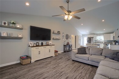 Living room featuring dark hardwood / wood-style f