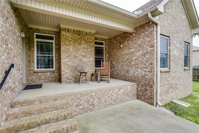 Private Covered Back Porch overlooking patio and p