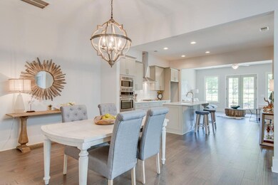 Here's a view of the great room that flows into the chef's kitchen and is open to the great room.