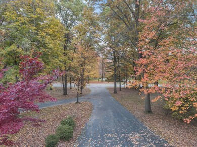 11-2880-W-Maple-Rd-WindowStill-Real-Esta