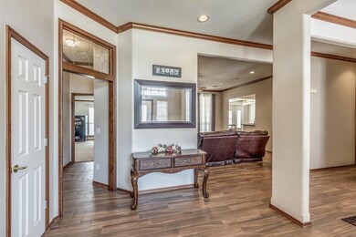 Entry. Primary suite and study/4th bed to left. Li