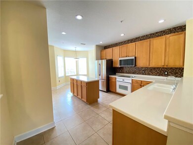Kitchen with island and dining area