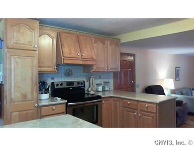 Kitchen Remodeled kitchen with light Maple cabinet