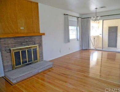 Formal dining area with slider to breezeway.