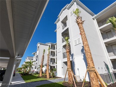 View of apartment building / complex with central