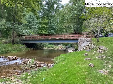 Nestled in the woods on 9+ acres, this large main