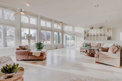 Spacious Living Room with Floor to Ceiling Windows