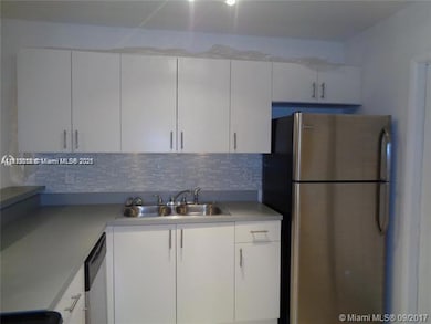 Palm Court Apartments unit D212, Miami, FL 33162 - photo 3