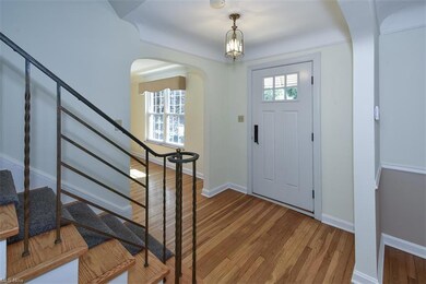 Entryway with light hardwood floors