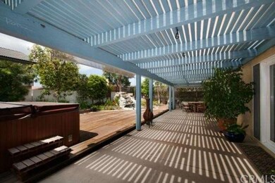 PATIO COVER RUNS ENTIRE LENGTH OF HOME
