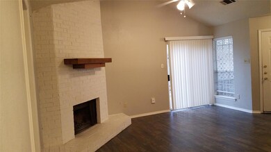 Unfurnished living room featuring lofted ceiling,