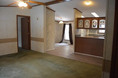 Spacious living room, vaulted ceiling open to the 