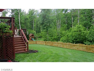 Exterior Back - Beautiful fenced back yard.  Multi